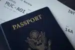 passport booklet on top of white paper